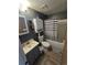 Cozy bathroom with vanity, toilet and shower at 275 Mckinley Dr, Bennett, CO 80102