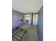 Cozy bedroom with closet and large window providing natural light at 275 Mckinley Dr, Bennett, CO 80102