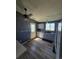 Well-lit kitchen featuring updated gray cabinets, stainless appliances, and modern finishes, making it perfect for cooking at 275 Mckinley Dr, Bennett, CO 80102