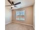 Bedroom with neutral tones, a ceiling fan, and natural light at 6916 Crestop Pl # F, Parker, CO 80138