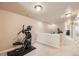 Upstairs bonus room offers a flexible space for recreation or exercise at 6916 Crestop Pl # F, Parker, CO 80138