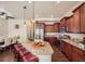 Gourmet kitchen featuring stainless steel appliances, granite countertops, and breakfast bar seating at 6916 Crestop Pl # F, Parker, CO 80138