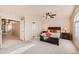 Bright, spacious main bedroom with a queen bed, ceiling fan, and great lighting at 6916 Crestop Pl # F, Parker, CO 80138