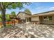 Spacious backyard featuring a large patio and upper deck perfect for entertaining and enjoying outdoor living at 6407 S Heritage W Pl, Centennial, CO 80111