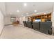 Finished basement featuring a media area with built-in shelving and comfortable seating at 6407 S Heritage W Pl, Centennial, CO 80111