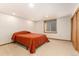 Bedroom with carpet flooring, window, and closet at 6407 S Heritage W Pl, Centennial, CO 80111