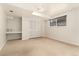 Large bedroom features a closet, desk, and a light-filled window at 6407 S Heritage W Pl, Centennial, CO 80111
