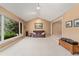Bright living room with vaulted ceilings, large windows, and neutral carpet at 6407 S Heritage W Pl, Centennial, CO 80111