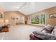 Spacious living room featuring vaulted ceilings and a large window at 6407 S Heritage W Pl, Centennial, CO 80111