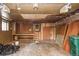 Unfinished basement with workbench and storage area at 1195 Boston St, Aurora, CO 80010