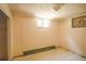 Unfinished basement with visible pipes, one window, and concrete floor offers potential for customization at 1195 Boston St, Aurora, CO 80010