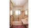 Bathroom with a glass-enclosed shower and vintage sink at 1195 Boston St, Aurora, CO 80010