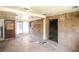 Enclosed sun room with brick walls and windows at 1195 Boston St, Aurora, CO 80010