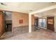 Enclosed sun room with brick walls at 1195 Boston St, Aurora, CO 80010