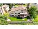 Spacious backyard featuring a multi-tiered deck perfect for outdoor entertaining at 11241 E Cimmarron Dr, Englewood, CO 80111