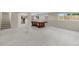 Large basement with neutral carpeting, perfect for recreation or additional living space at 11241 E Cimmarron Dr, Englewood, CO 80111