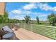 Outdoor deck featuring wicker seating and table with great views of the community at 11241 E Cimmarron Dr, Englewood, CO 80111