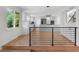 Kitchen view with modern stainless steel appliances and white cabinetry at 11241 E Cimmarron Dr, Englewood, CO 80111