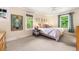 Bedroom featuring neutral tones, plush carpets, and natural light at 562 N Gilpin St, Denver, CO 80218