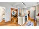 Kitchen with an island and stainless appliances is open to an adjacent dining room at 562 N Gilpin St, Denver, CO 80218