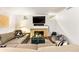Cozy living room with a fireplace, couch, and decor at 562 N Gilpin St, Denver, CO 80218