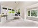 Bright office space featuring many windows and white trim at 562 N Gilpin St, Denver, CO 80218