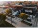 Trendy restaurant Avanti with an outdoor dining area bustling with patrons in a vibrant urban setting at 3321 Navajo St, Denver, CO 80211