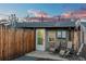 Relaxing backyard retreat with lounge chairs, privacy fence, and cozy atmosphere at 3321 Navajo St, Denver, CO 80211