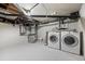Functional basement with a new washer/dryer set and modern utilities at 3321 Navajo St, Denver, CO 80211