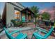 Charming home exterior featuring a cozy front porch and inviting curb appeal at dusk at 3321 Navajo St, Denver, CO 80211