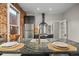 Stainless steel appliances and dark cabinets in a modern kitchen at 3321 Navajo St, Denver, CO 80211