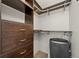Organized walk-in closet with custom shelving, drawers, and modern closet system at 3321 Navajo St, Denver, CO 80211