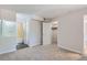 Cozy bedroom with neutral carpeting, an attached bathroom, and a large walk-in closet at 3550 S Harlan St # 177, Denver, CO 80235