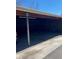 Exterior view of the Carport with parking spots and support beams at 3550 S Harlan St # 177, Denver, CO 80235