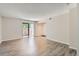 Spacious living room with sliding glass doors leading to a patio and neutral wall paint at 3550 S Harlan St # 177, Denver, CO 80235