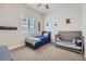 This cozy bedroom with plenty of space, natural light, and decorative touches is ideal for a  at 4536 Shady Path Ln, Castle Rock, CO 80104
