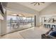 Bright living room with access to a large outdoor deck through sliding glass doors at 6550 S Oak Ct, Littleton, CO 80127