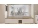 Cozy window seat with storage and a view of the neighborhood at 6550 S Oak Ct, Littleton, CO 80127