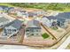 Aerial view of homes in a neighborhood showing landscaped yards and community layout at 4418 Soapberry Pl, Castle Rock, CO 80108