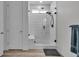 Bathroom with large glass shower and white subway tile at 4418 Soapberry Pl, Castle Rock, CO 80108