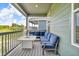 Covered patio with outdoor seating and scenic view at 4418 Soapberry Pl, Castle Rock, CO 80108
