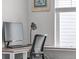 Office space with desk, computer, lamp and window, perfect for productivity and natural light at 4418 Soapberry Pl, Castle Rock, CO 80108