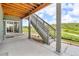 Walk-out patio with stairs leading to the backyard at 4418 Soapberry Pl, Castle Rock, CO 80108