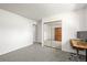 Bright bedroom features neutral carpet, white walls, and mirrored closet doors at 770 S Youngfield, Lakewood, CO 80228