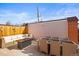 Inviting patio area with comfortable sofa and dining set for outdoor enjoyment at 770 S Youngfield, Lakewood, CO 80228