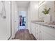 Chic bathroom with granite countertops, a view into the walk-in closet and a modern shower at 5354 Blue Lunar Ln, Castle Rock, CO 80104