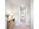 Bright hallway featuring wood-style floors and stylish decorations, creating a welcoming transition area at 5354 Blue Lunar Ln, Castle Rock, CO 80104