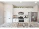 Well-equipped kitchen featuring granite counters, stainless appliances, and lots of storage space at 5354 Blue Lunar Ln, Castle Rock, CO 80104