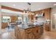 Beautiful kitchen featuring custom wood cabinets, stainless steel appliances and center island at 913 Alkire Ct, Golden, CO 80401