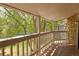 Relaxing balcony with wooden floors provides a serene outdoor view at 8600 E Alameda Ave # 17-203, Denver, CO 80247
